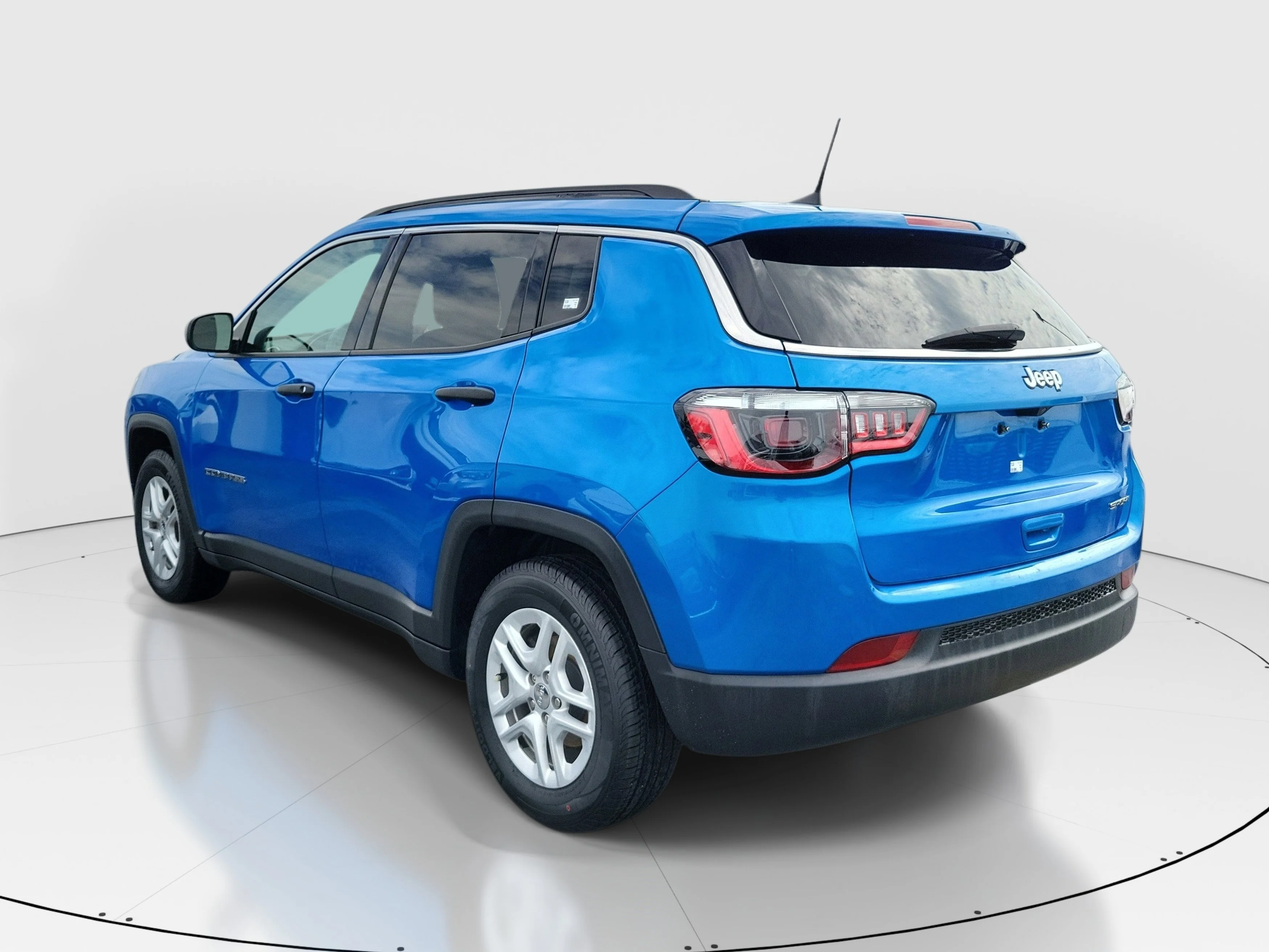 Used 2021 Laser Blue Pearlcoat Jeep Sport image 4
