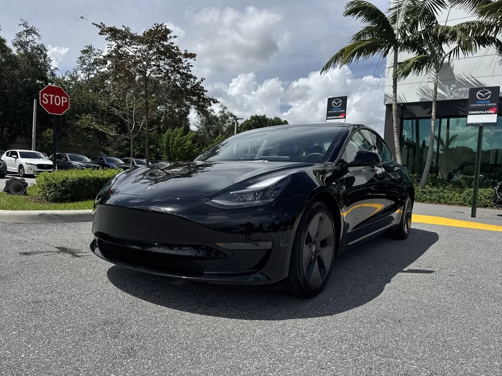 Used 2023 Solid Black Tesla  image 31