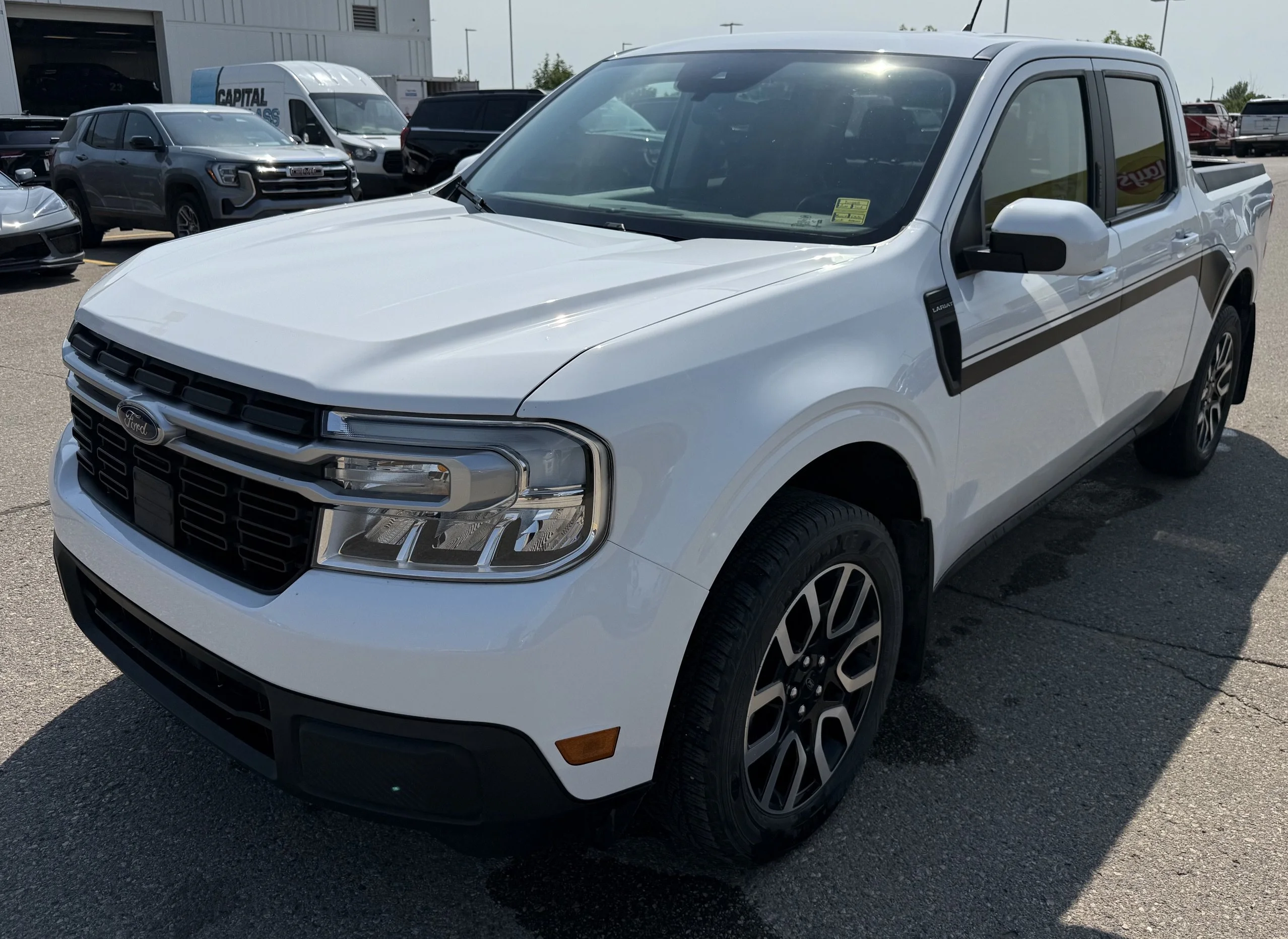 Used 2022 WHITE Ford LARIAT SuperCrew   AWD **New Arrival** image 1
