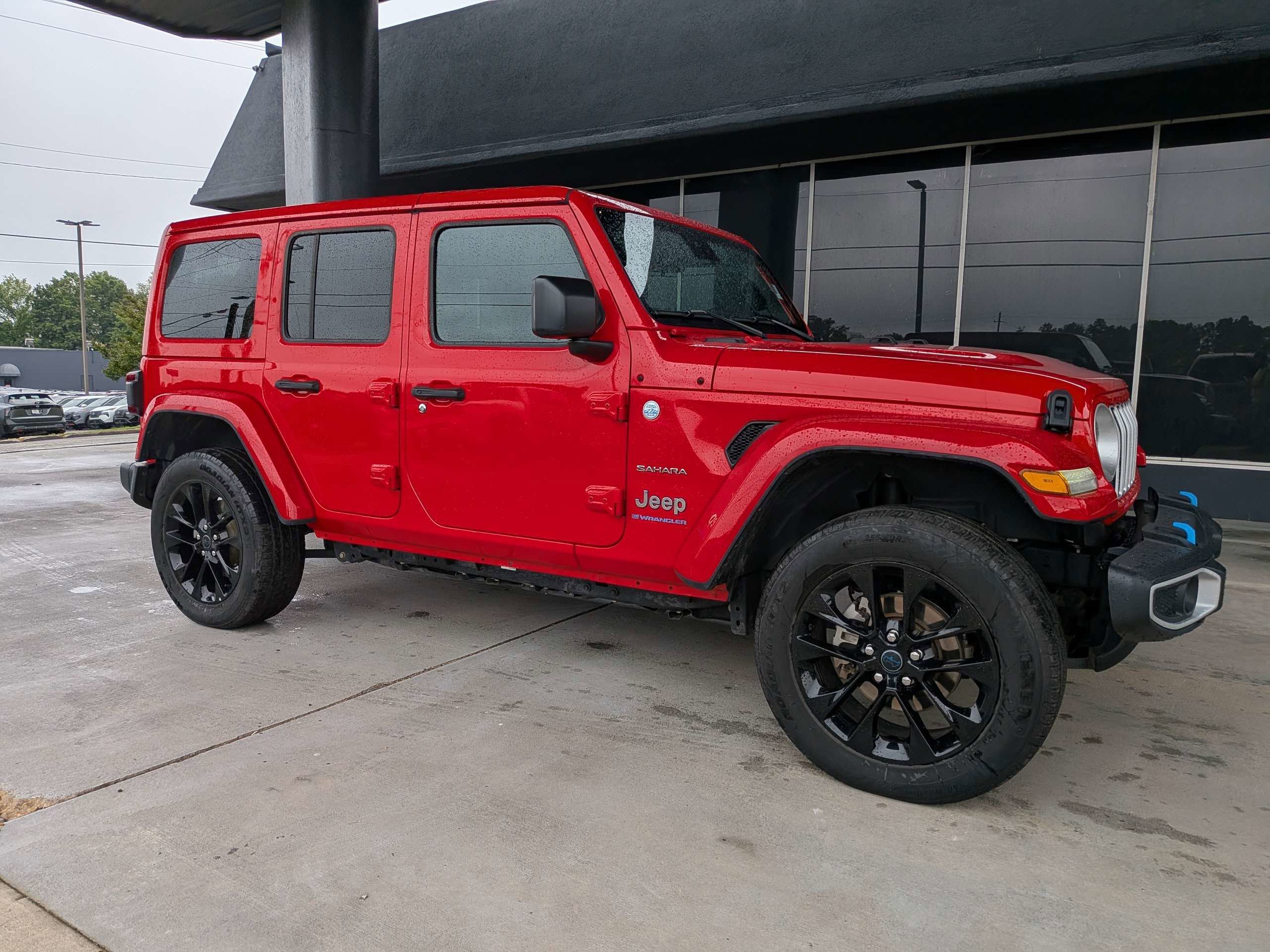 Used 2024 Red Jeep Sahara 4xe image 1