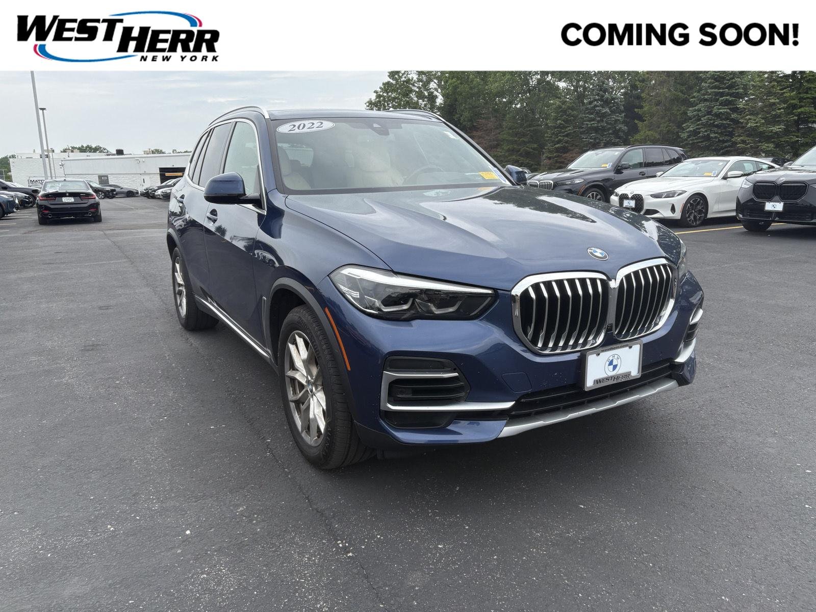 Used 2022 Phytonic Blue Metallic BMW xDrive40i image 1