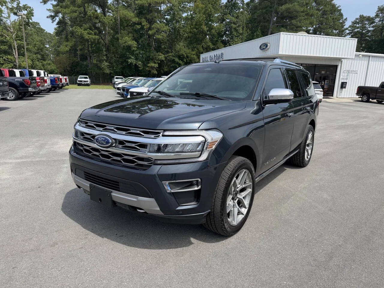 Used 2023 Stone Blue Ford Platinum 4x4 4dr SUV image 1