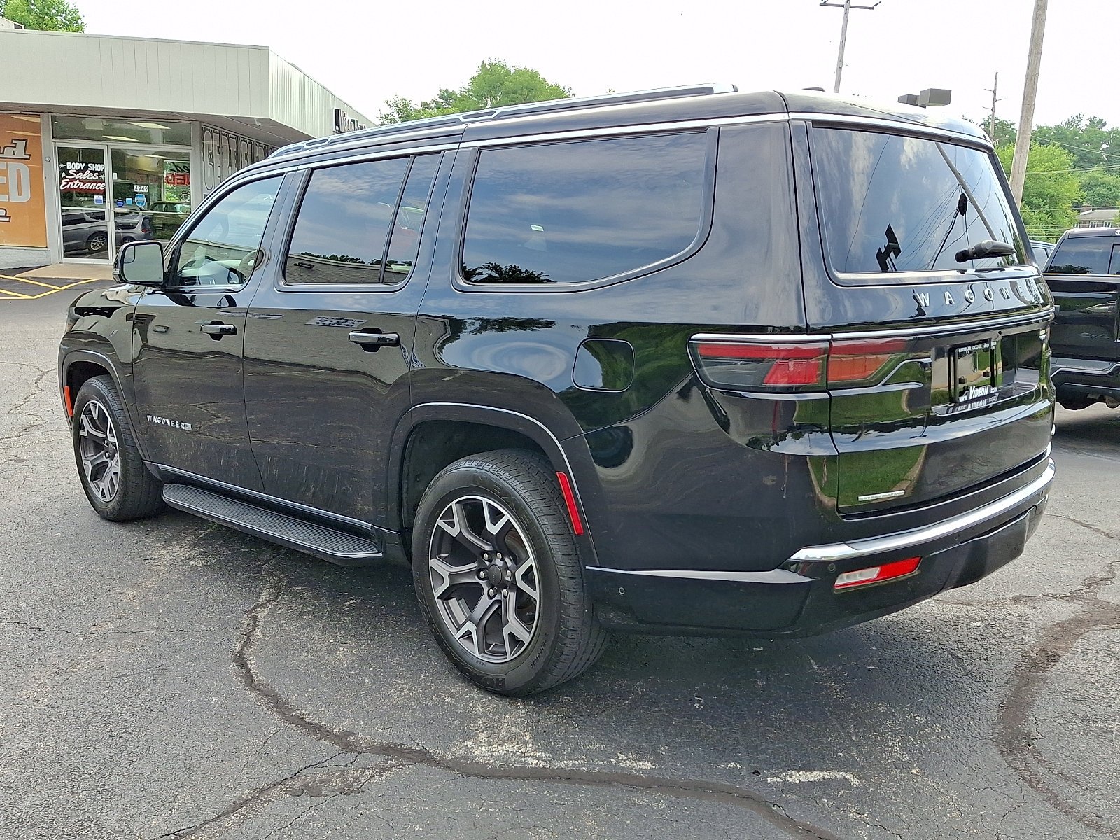 Certified Used 2023 Diamond Black Crystal Pearlcoat Jeep Series III image 4