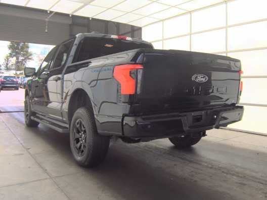 Used 2025 Agate Black Metallic Ford XLT image 4