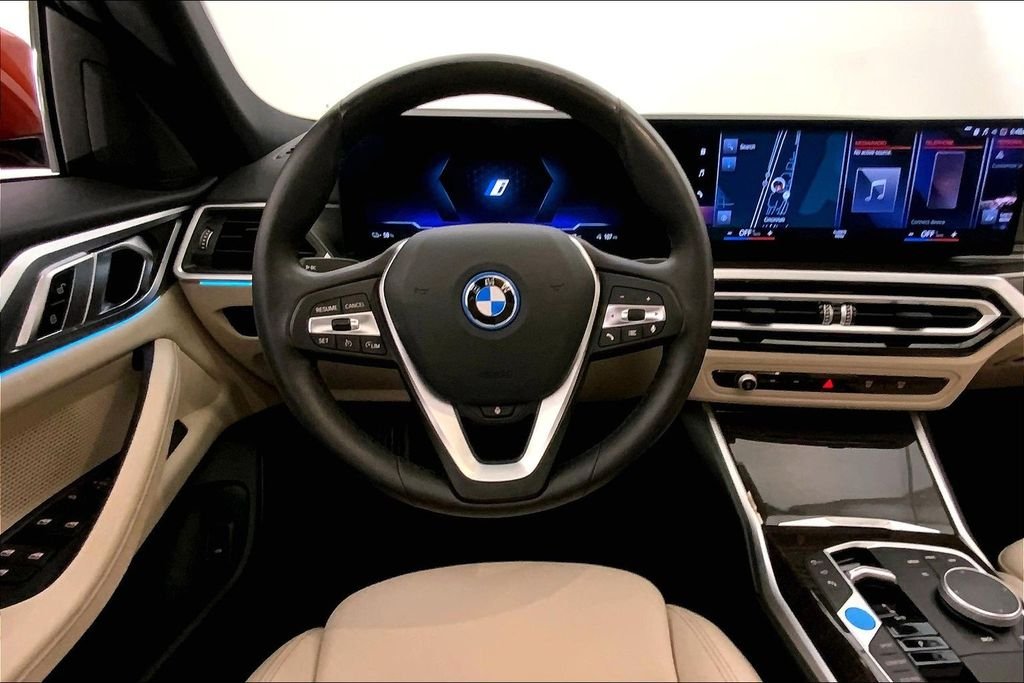 Used 2023 Sunset Orange Metallic BMW  image 4