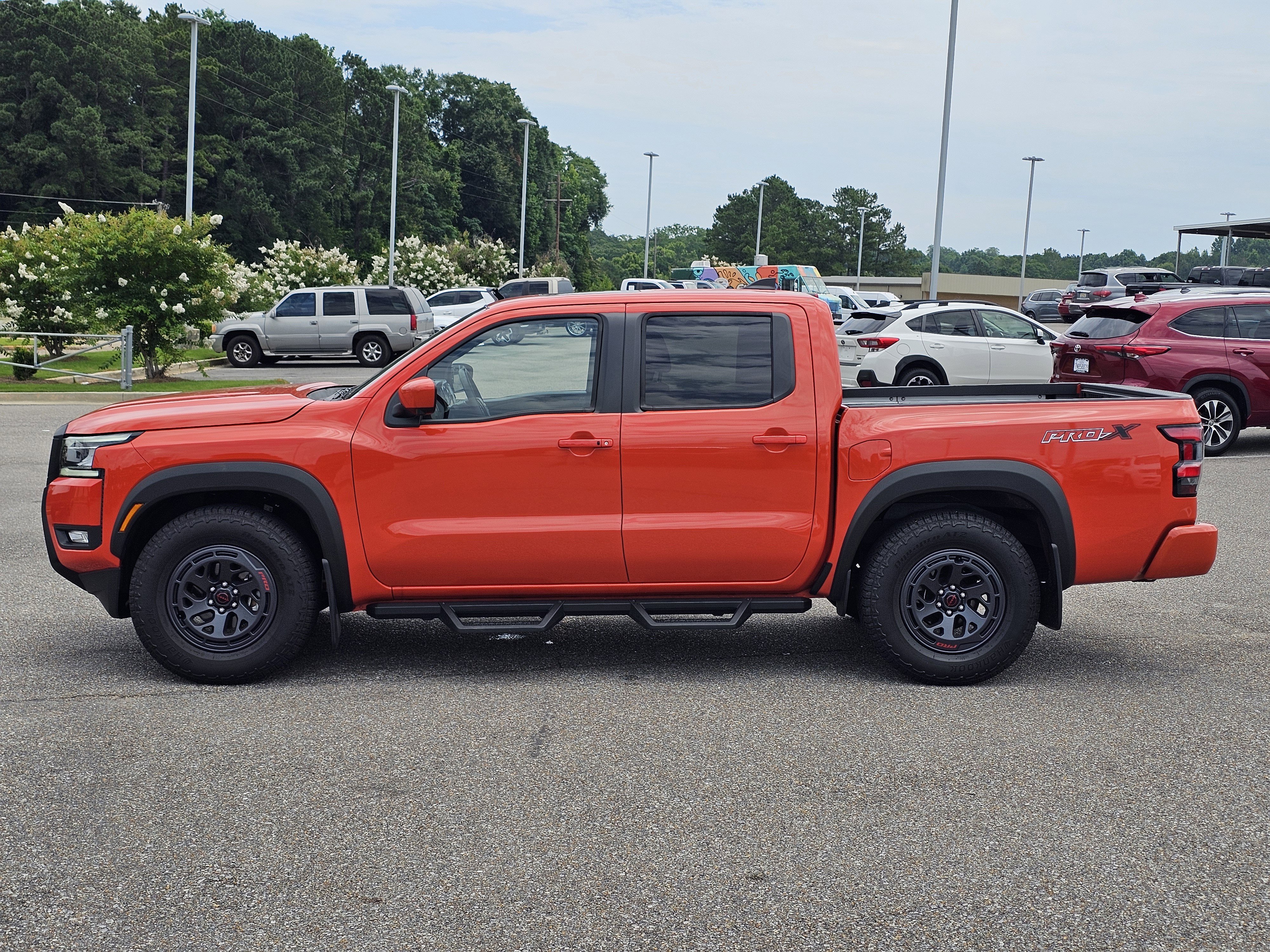 Used 2025 Afterburn Orange Nissan PRO-X image 14