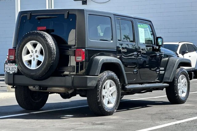 Used 2015 Black Clearcoat Jeep Unlimited Sport image 4