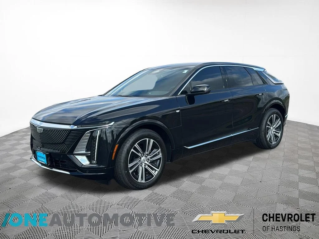 Used 2024 Stellar Black Metallic Cadillac Luxury 1 image 1