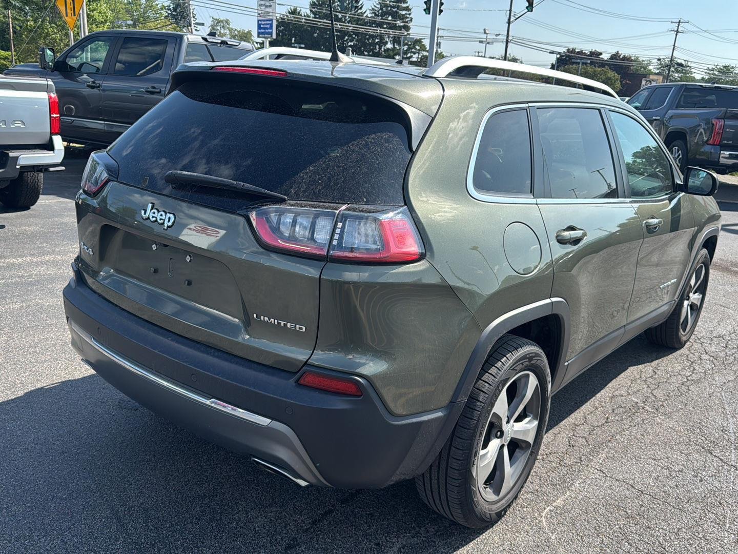Used 2019 Olive Green Pearlcoat Jeep Limited image 6