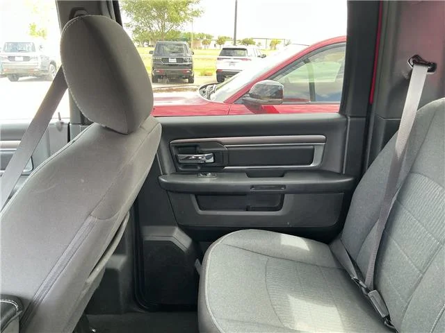 Used 2024 Flame Red Clearcoat RAM SLT 4x4 Crew Cab 5.6 ft. box 140 in. WB image 11