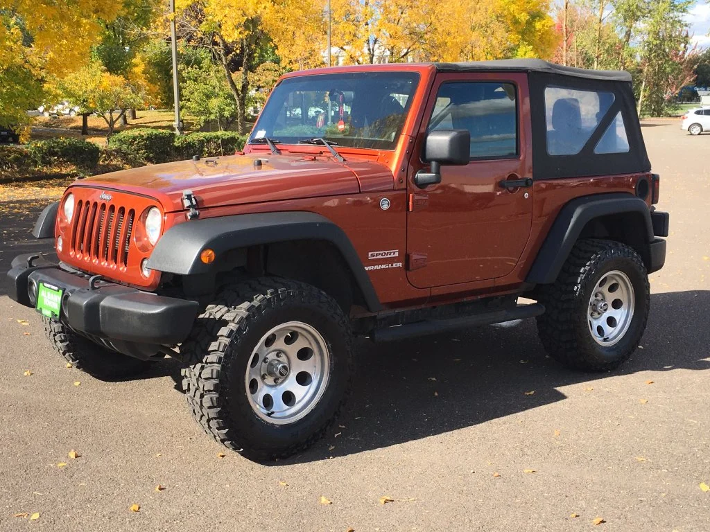 Used 2014 Orange Jeep Sport image 10