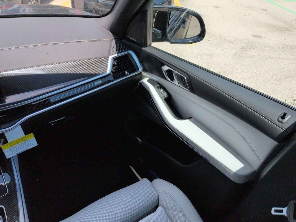 New 2026 Black Sapphire Metallic BMW M60i image 17