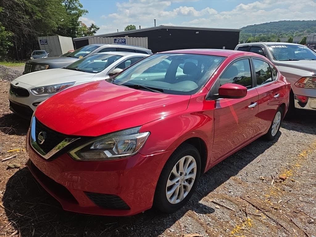 Used 2017 Red Nissan SV image 1