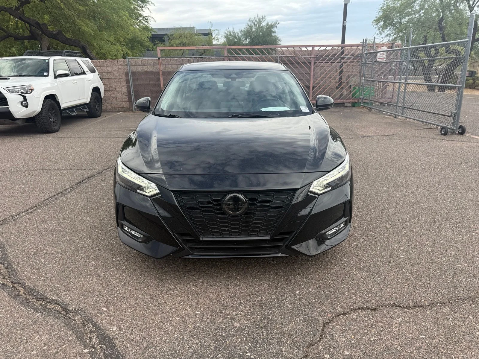Used 2023 Super Black Nissan SR image 1