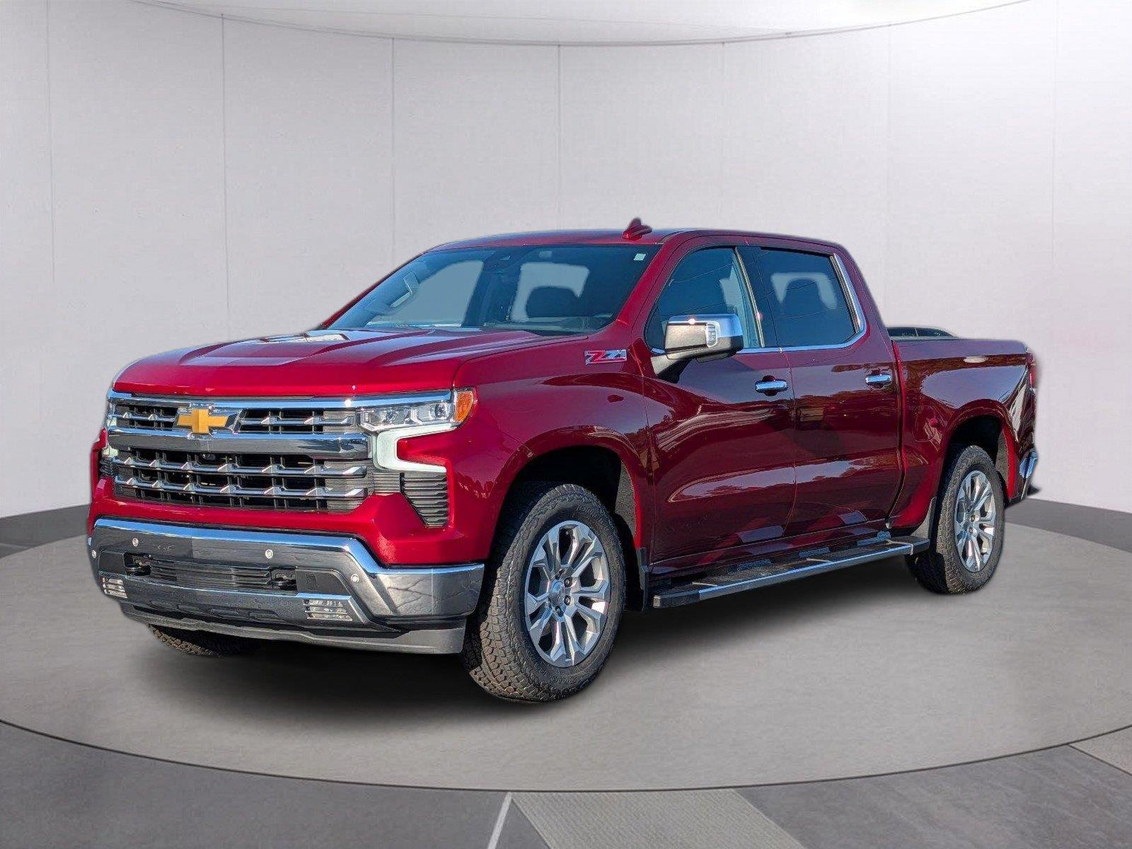 Used 2024 Radiant Red Tintcoat Chevrolet LTZ image 1