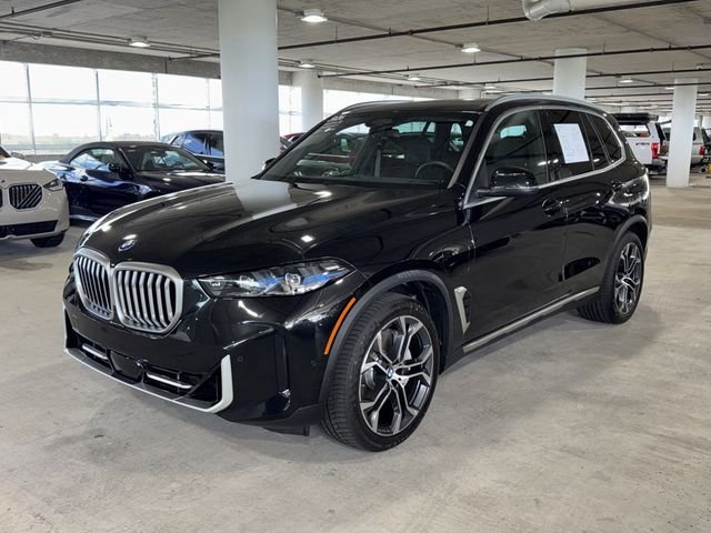 Certified Used 2026 Black Sapphire Metallic BMW xDrive50e image 4