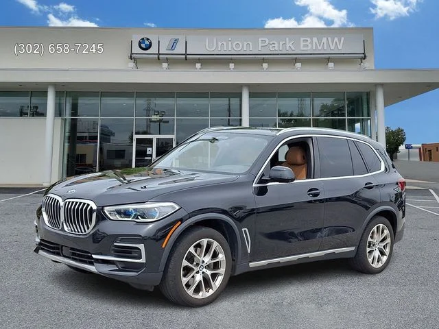 Certified Used 2023 Black Sapphire Metallic BMW xDrive40i image 1