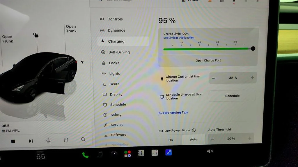Used 2023 Solid Black Tesla RWD image 19