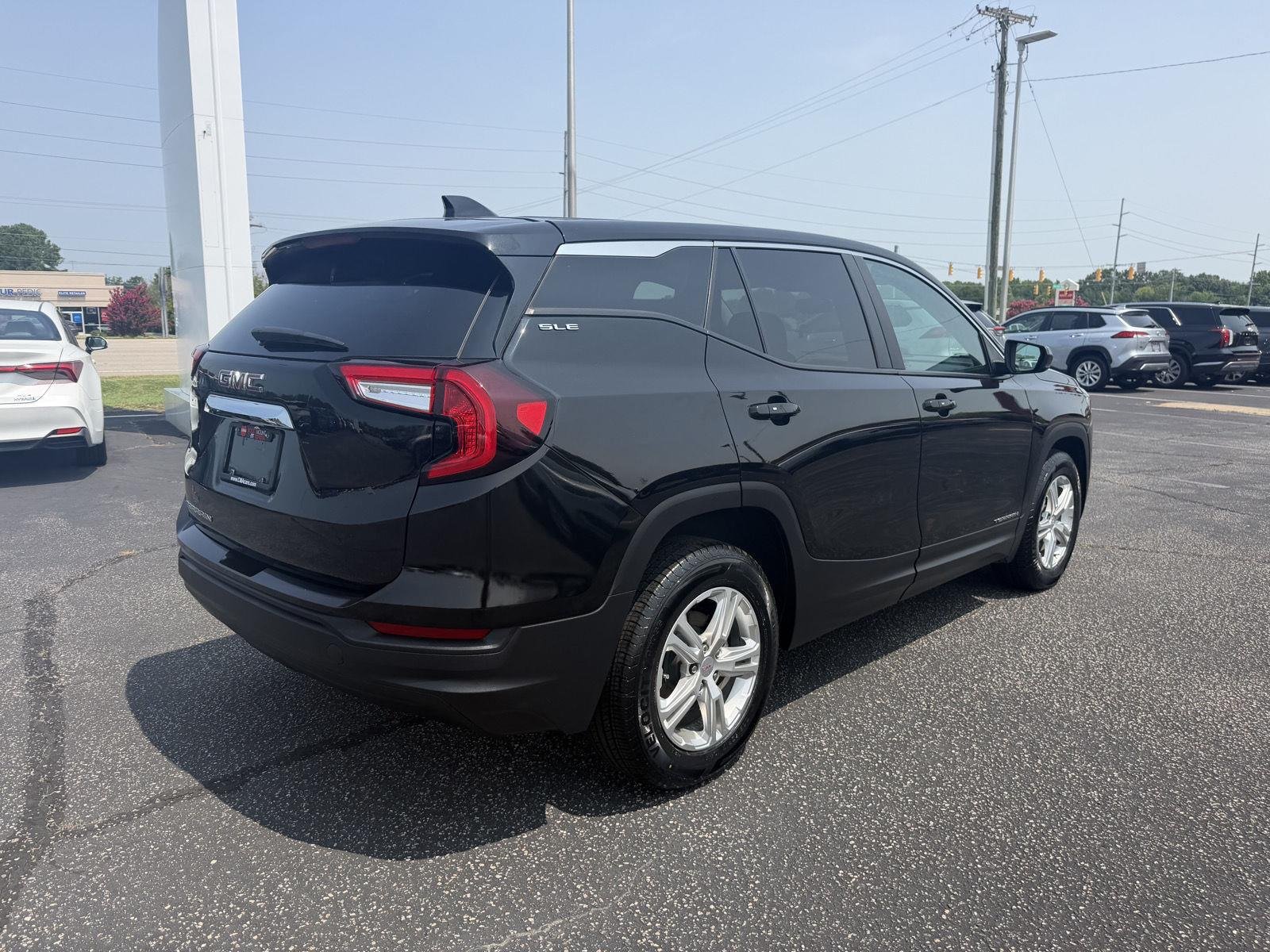 Used 2024 Ebony Twilight Metallic GMC SLE image 7