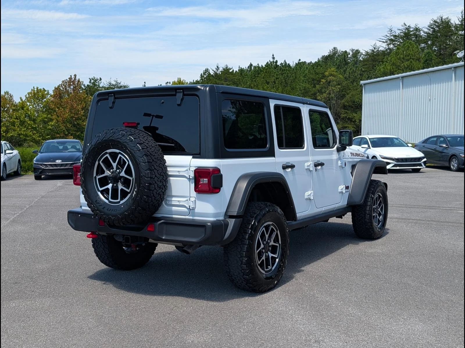 Used 2025 Bright White Clear Coat Jeep Rubicon image 6