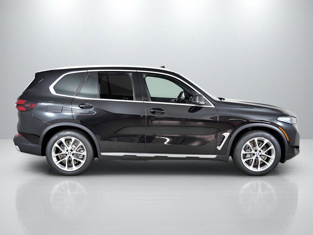 Used 2026 Black Sapphire Metallic BMW xDrive50e image 9
