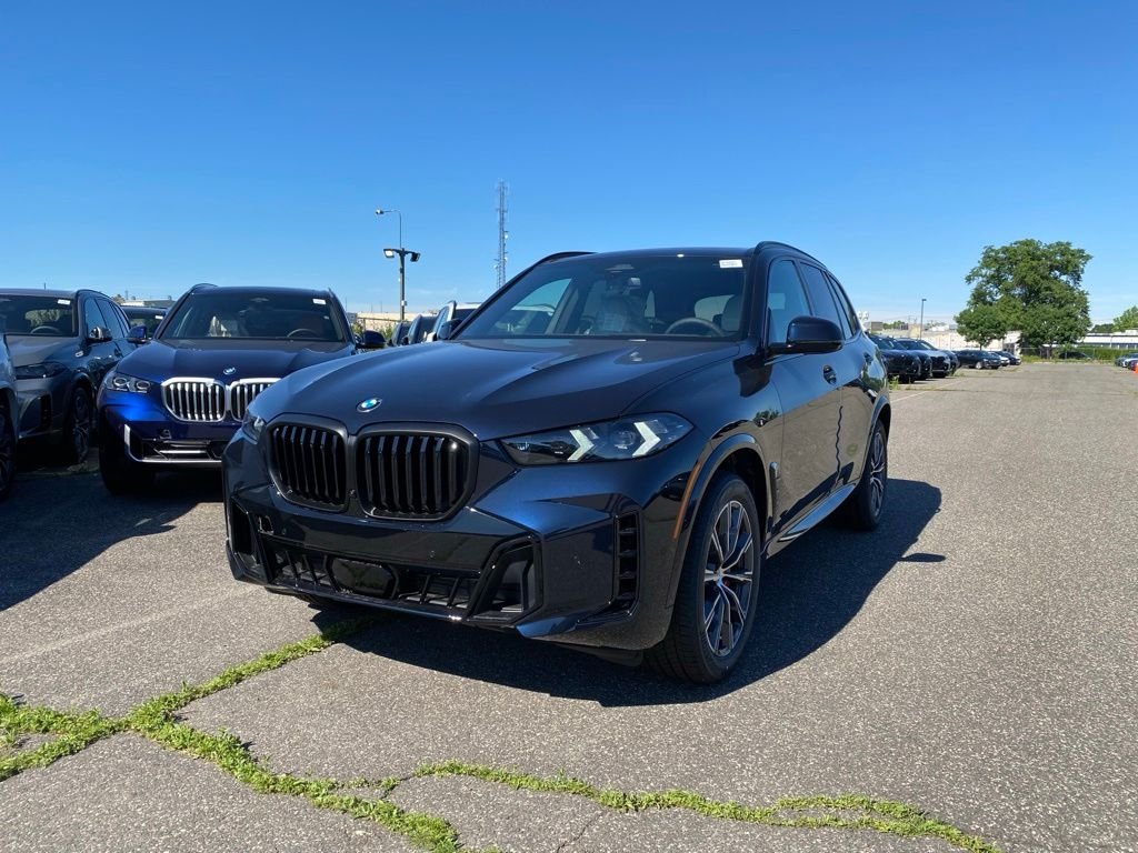 New 2026 Carbon Black Metallic BMW xDrive40i image 1
