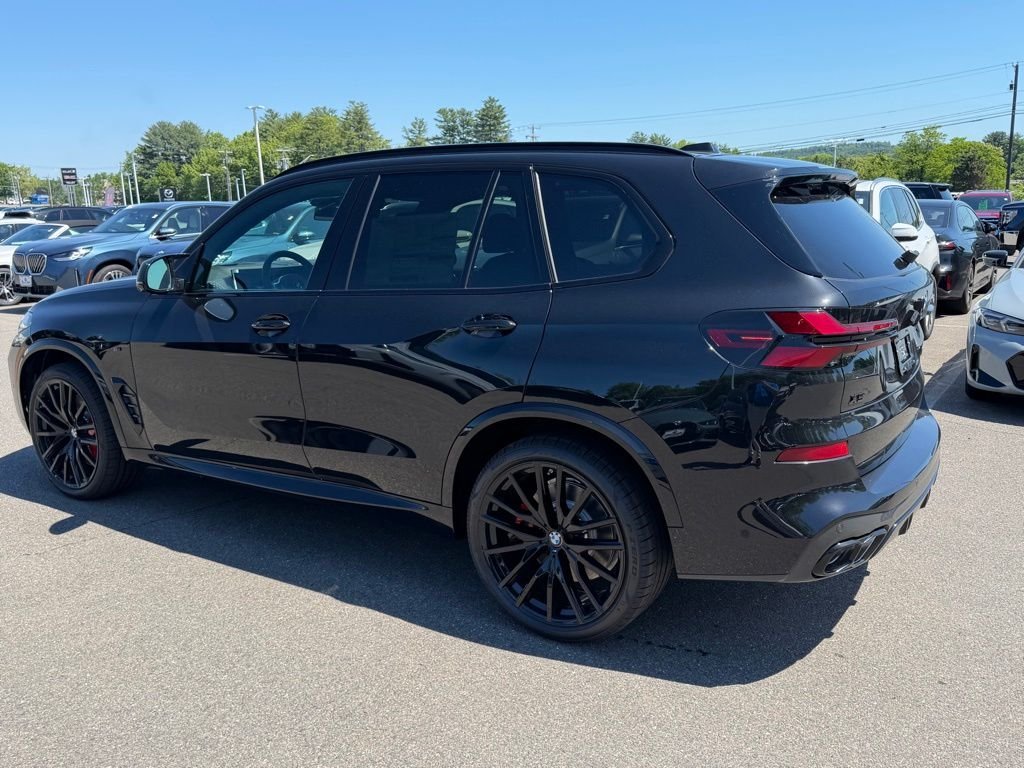 New 2026 Black Sapphire Metallic BMW M60i image 3
