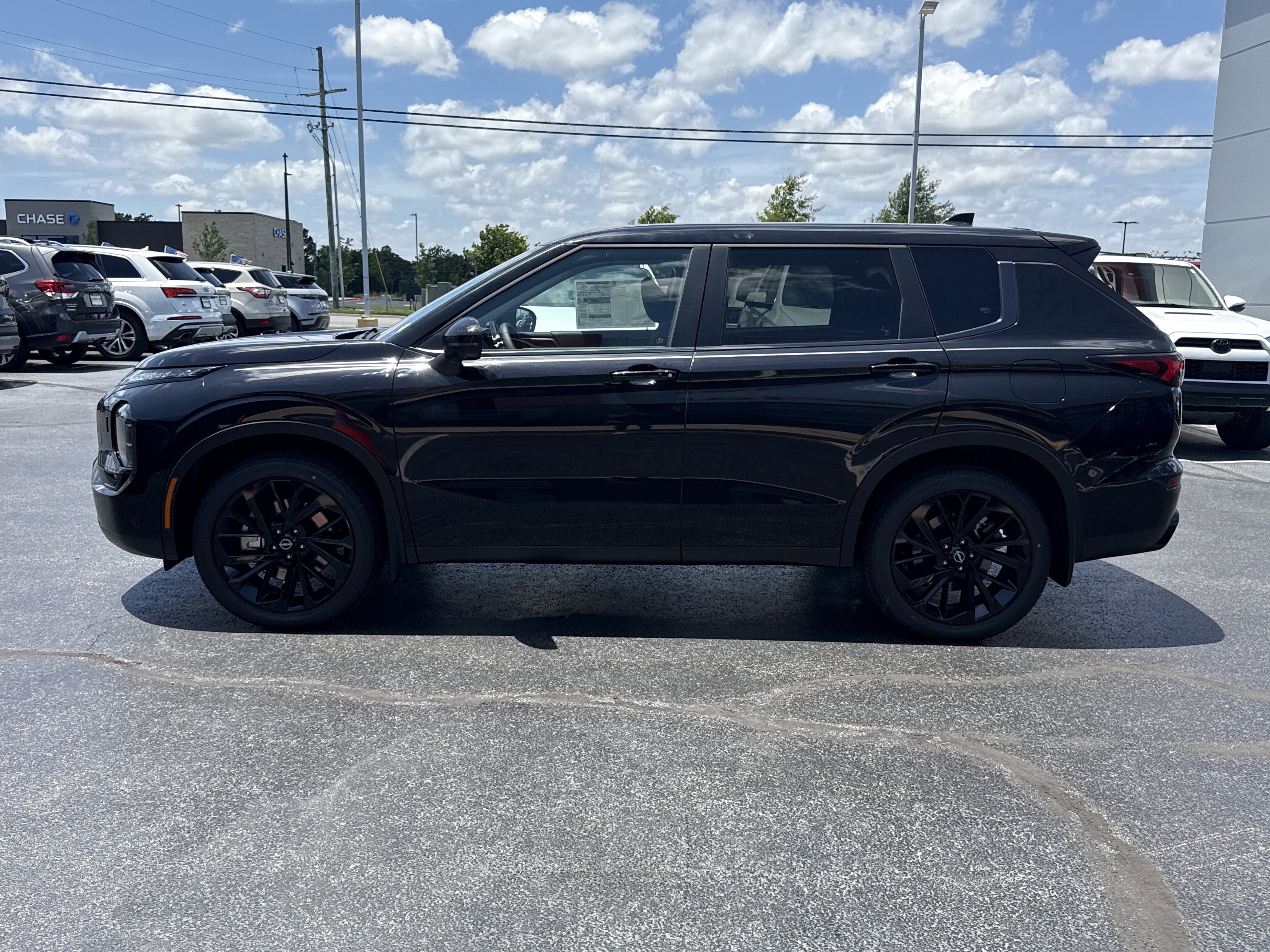New 2026 Cosmic Black Nissan SL AWD image 13