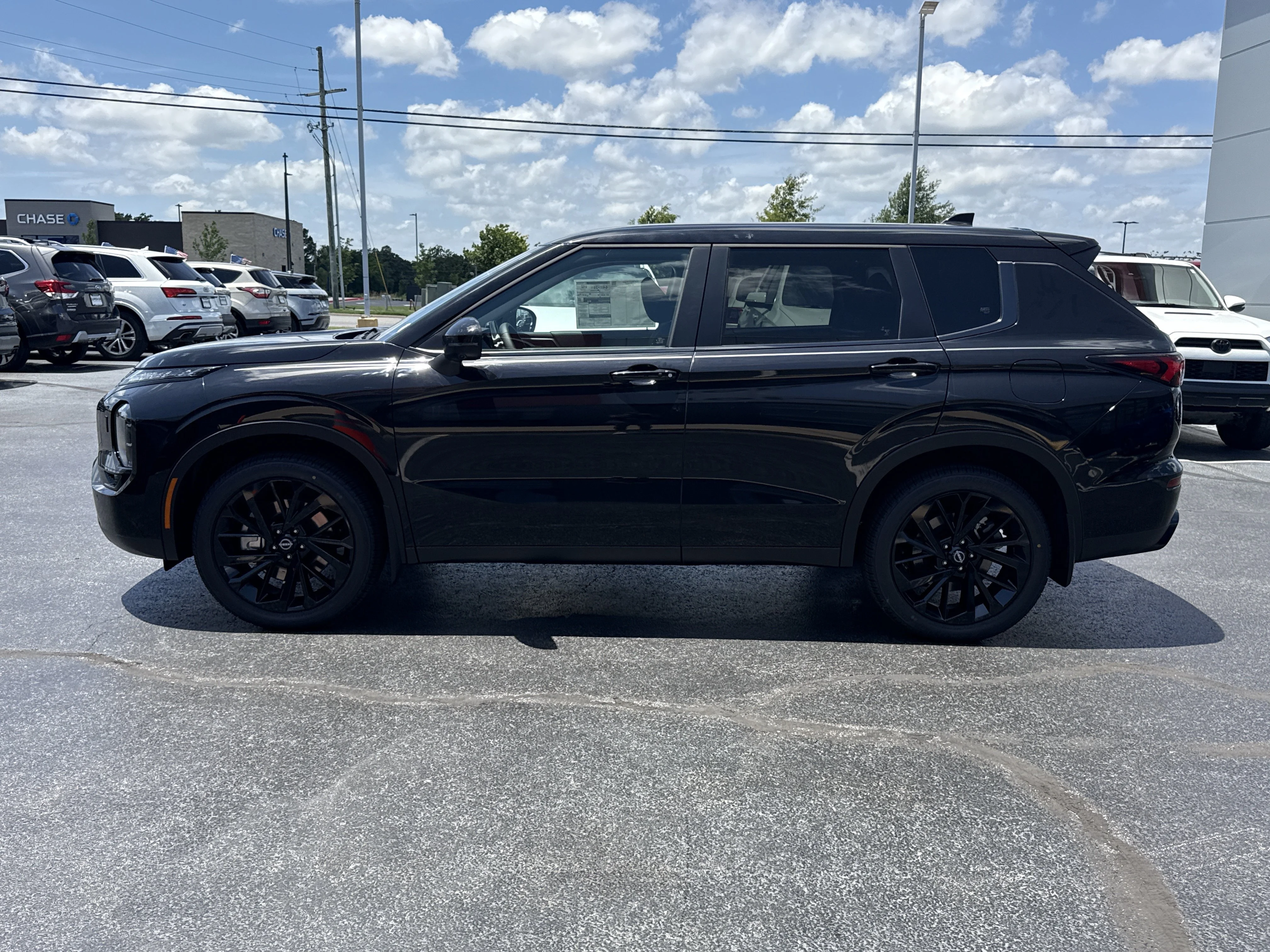 New 2026 Cosmic Black Nissan SL AWD image 13