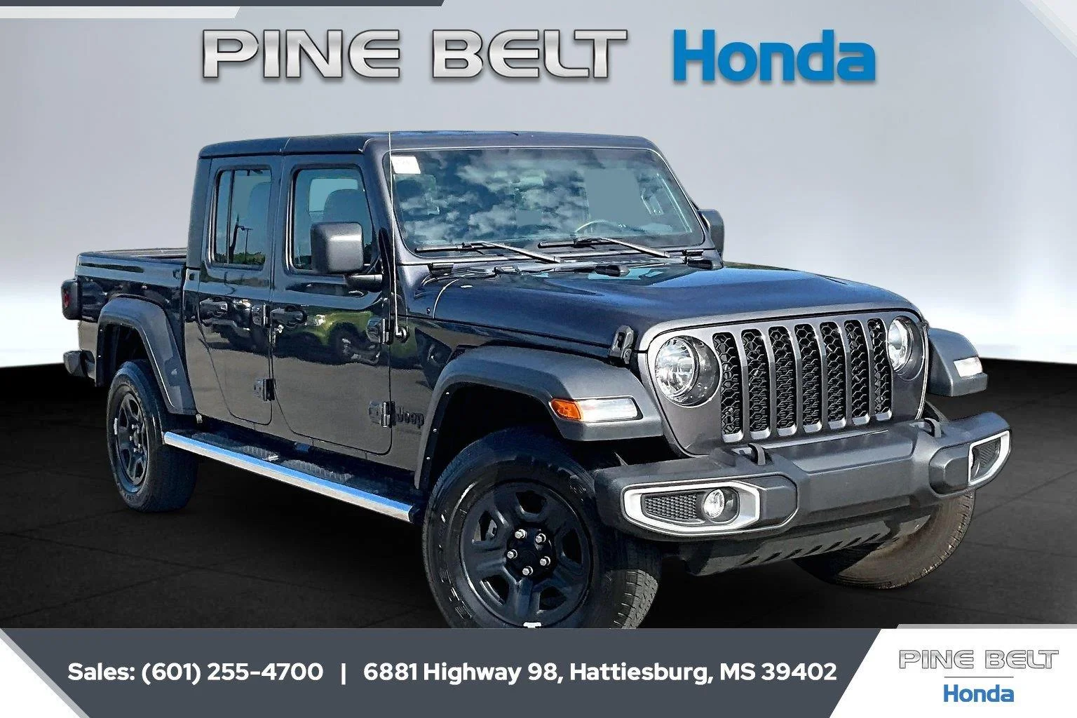 Used 2023 Granite Crystal Metallic Clearcoat Jeep Sport image 1