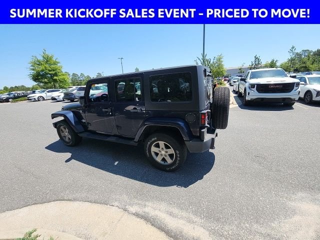 Used 2013 Blue Jeep Unlimited Sport image 10