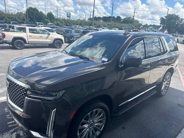 Used 2021 DARK MOCHA METALLIC Cadillac Premium Luxury image 1