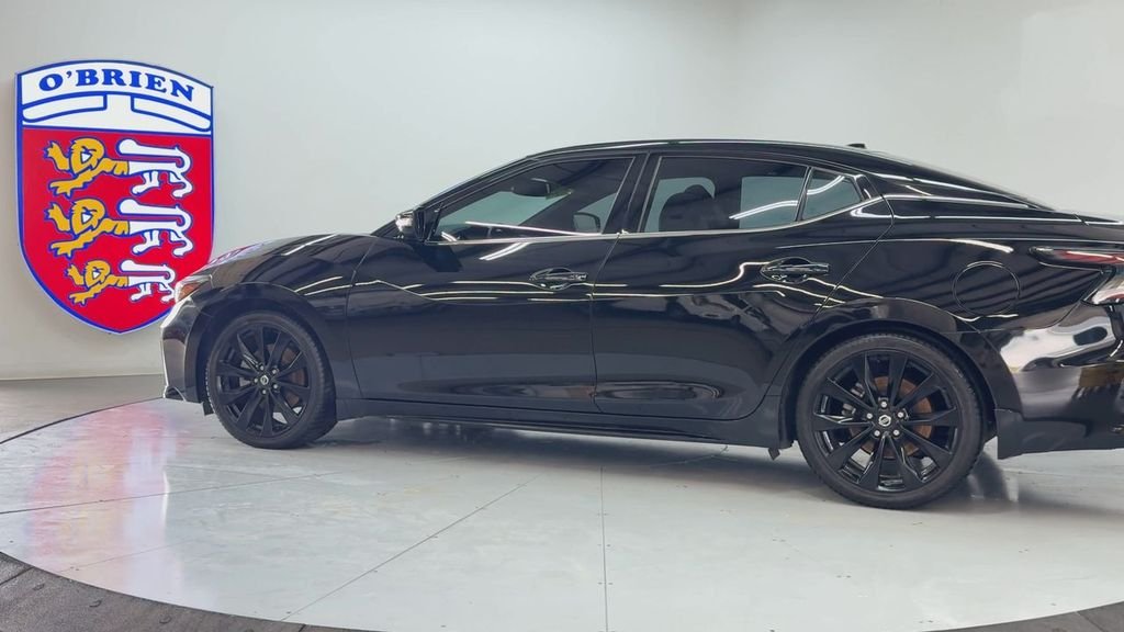 Used 2021 Super Black Nissan SR image 7