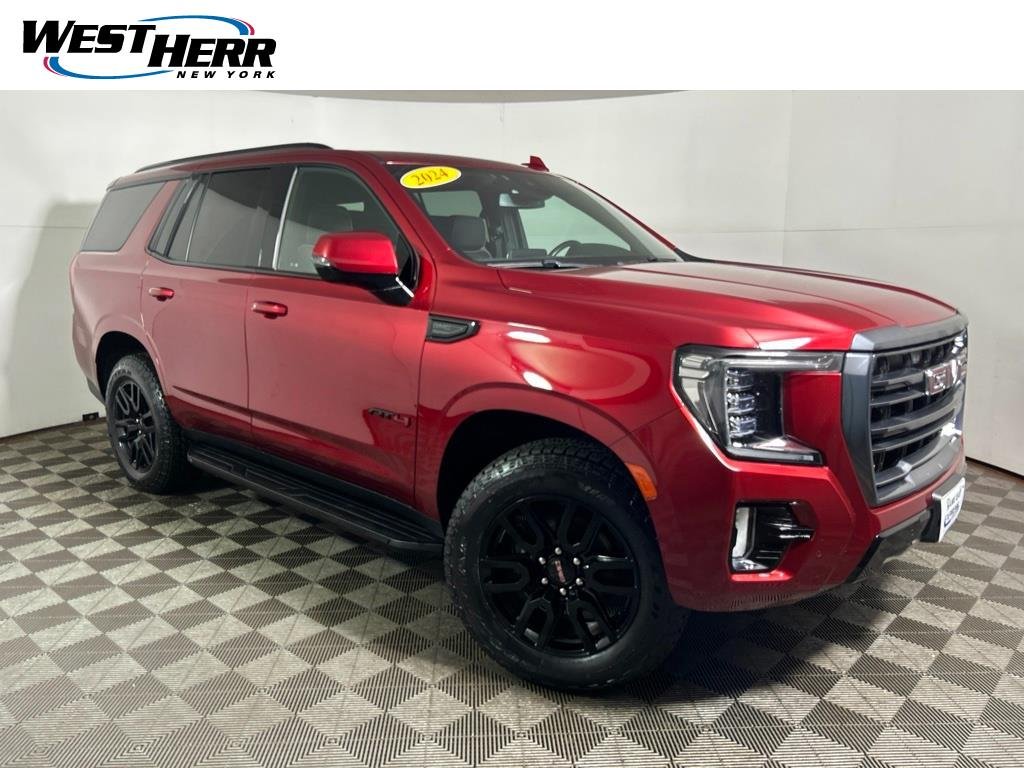 Used 2024 Volcanic Red Tintcoat GMC AT4 image 1
