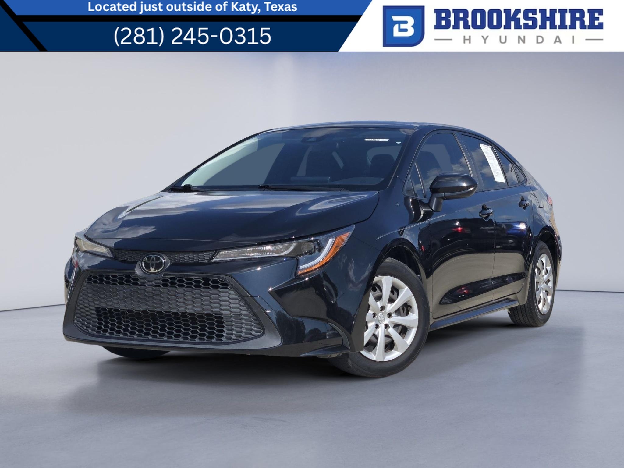 Used 2022 Black Sand Pearl Toyota LE image 1