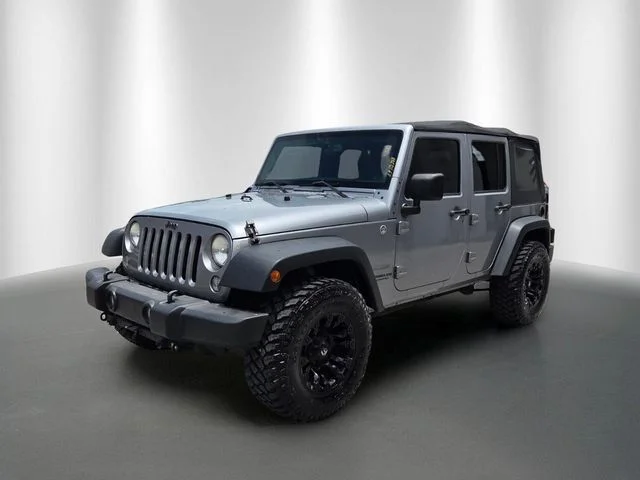 Used 2014 Jeep Wrangler Unlimited Sport with VIN 1C4BJWDG9EL228116 for sale in Lutz, FL