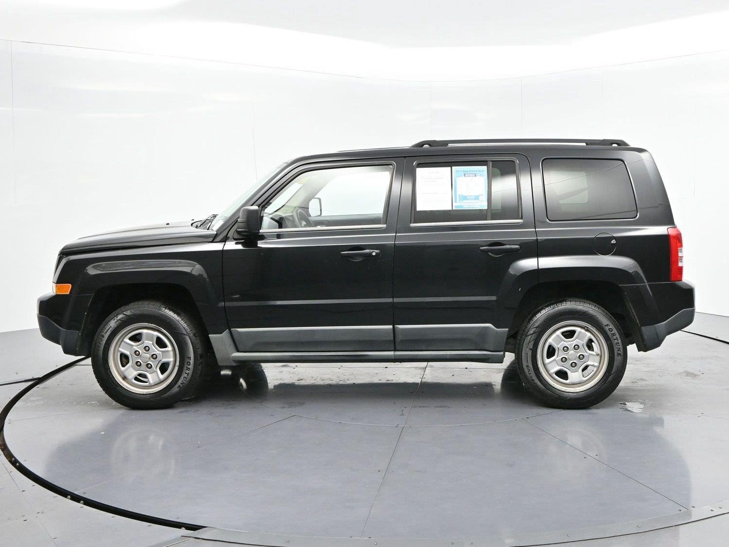 Used 2011 Brilliant Black Crystal Pearl Jeep Sport image 4