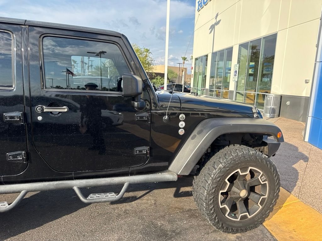 Used 2011 Black ClearCoat Jeep Unlimited Rubicon image 5