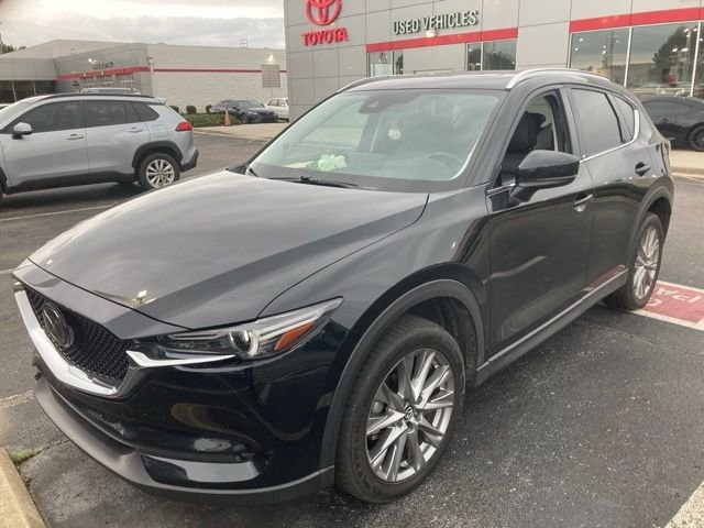 Used 2021 Black Mazda Grand Touring image 1
