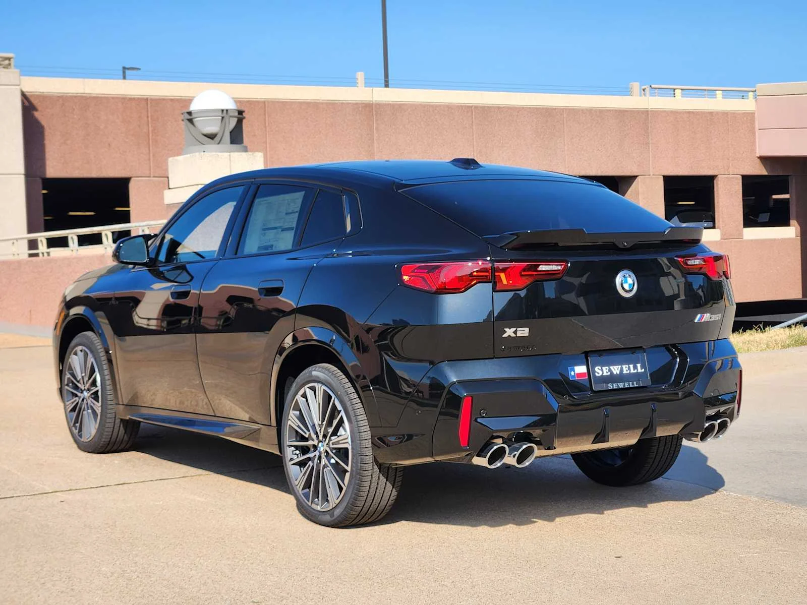 New 2026 Black Sapphire Metallic BMW M35i image 3