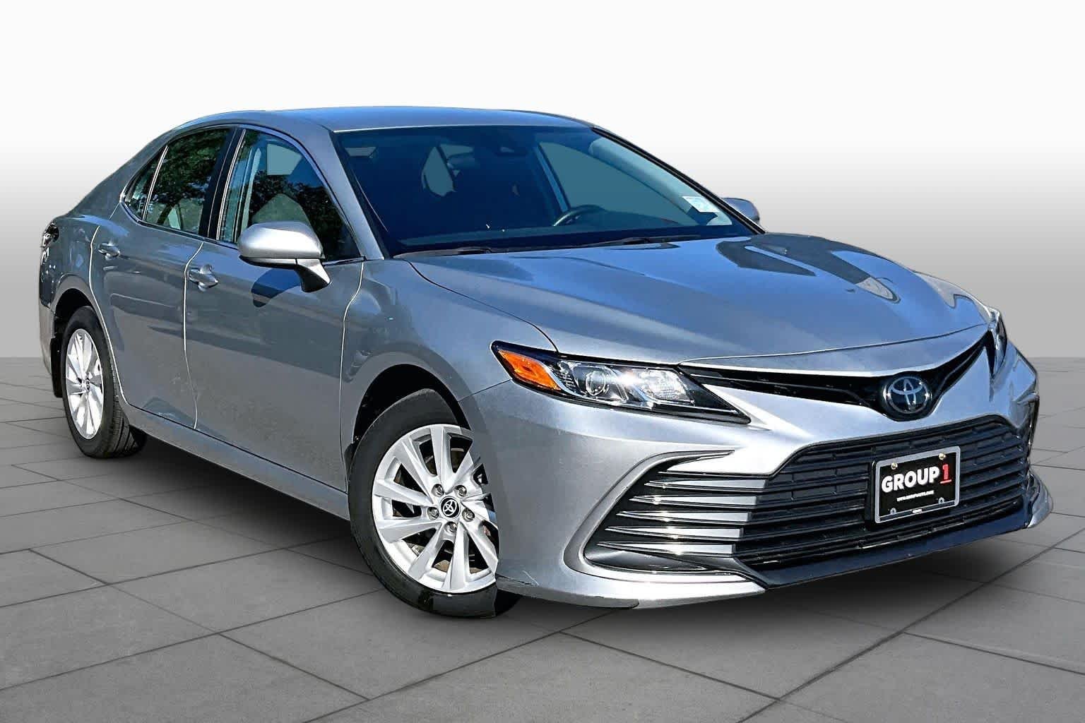 Used 2023 Celestial Silver Metallic Toyota LE image 3