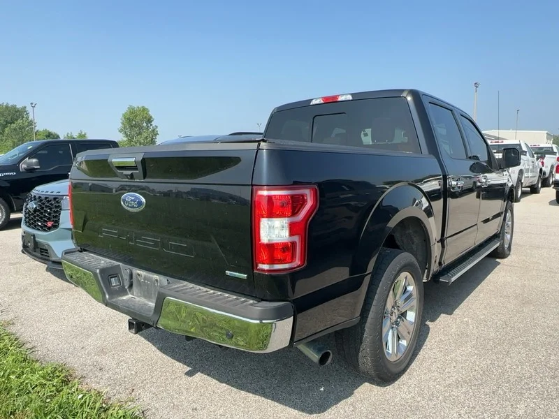 Used 2020 Agate Black Metallic Ford XLT 4WD SuperCrew 5.5