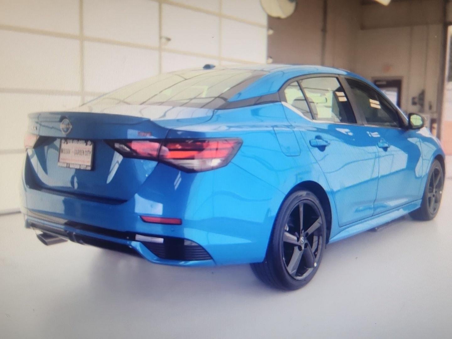 Used 2025 Electric Blue Metallic Nissan SR image 2