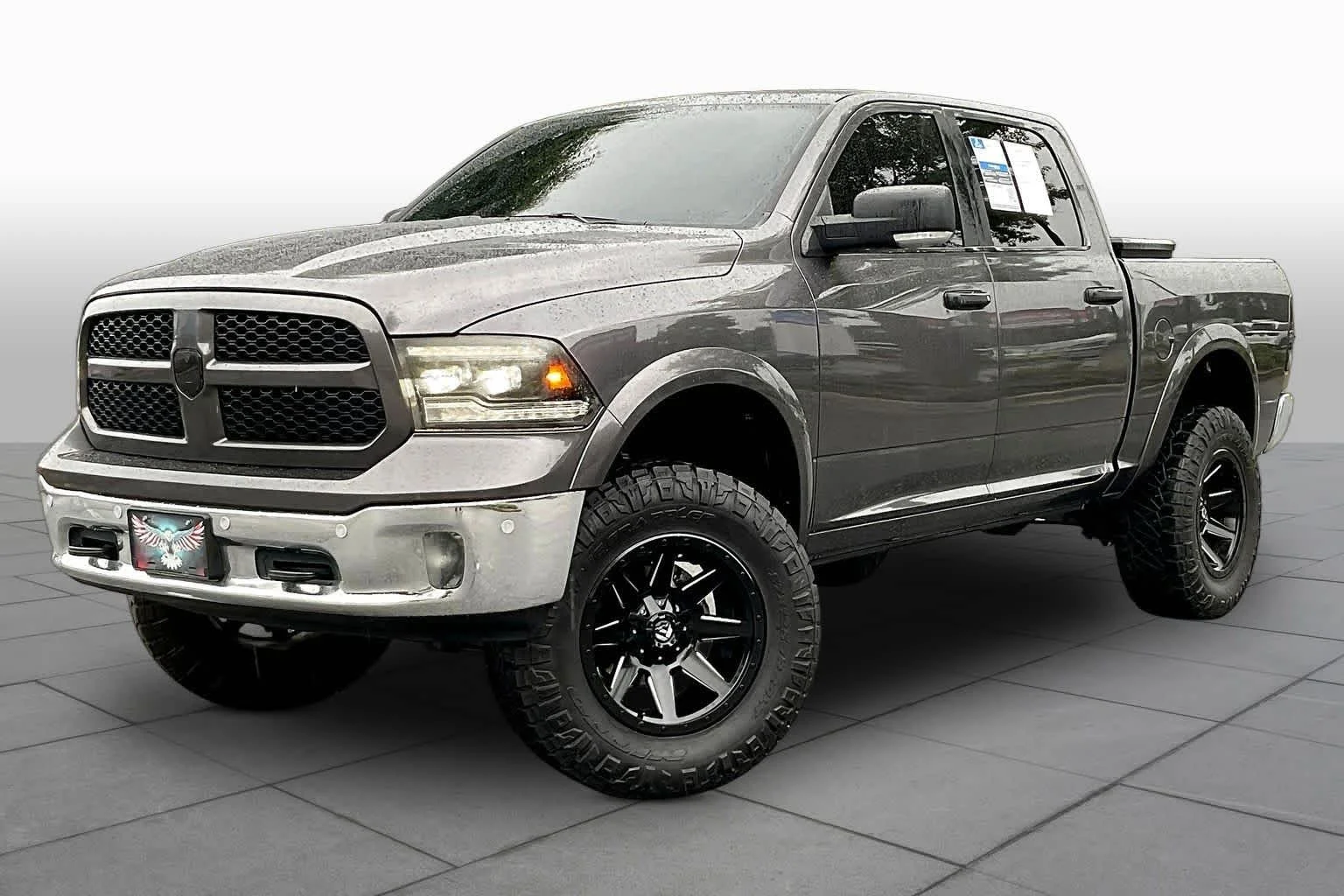 Used 2018 Granite Crystal Metallic Clearcoat Ram SLT image 1