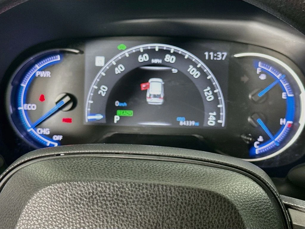 Used 2023 Midnight Black Metallic Toyota Hybrid LE image 12