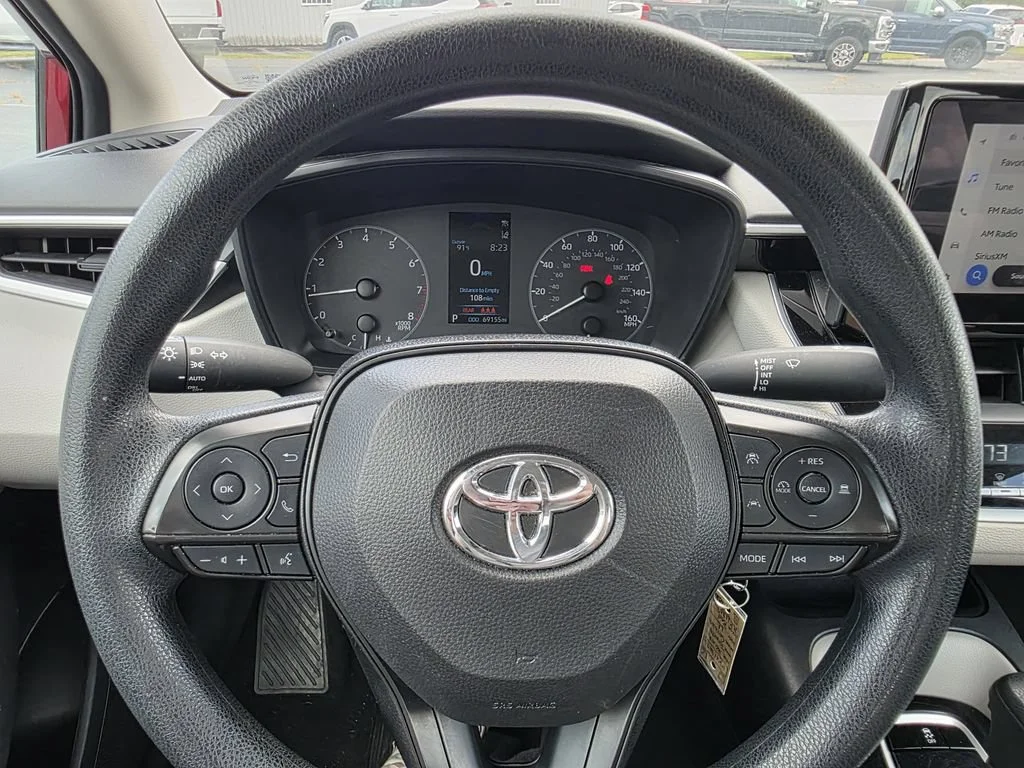 Used 2024 Red Med Toyota LE image 17