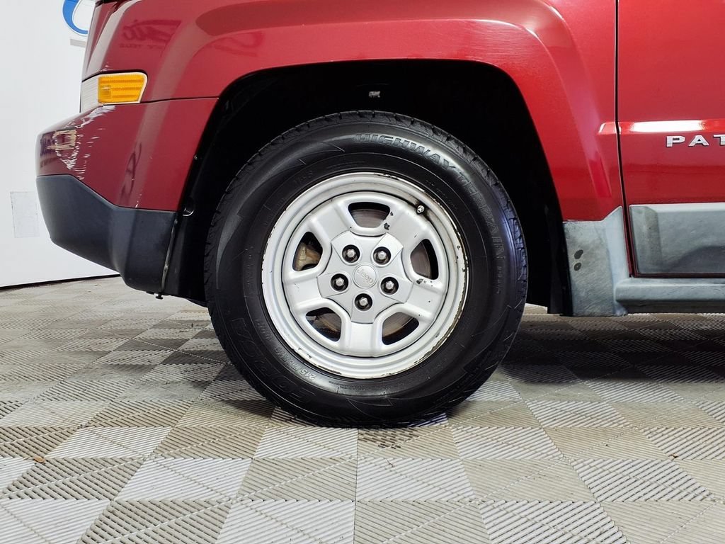 Used 2011 Deep Cherry Red Jeep Sport image 7