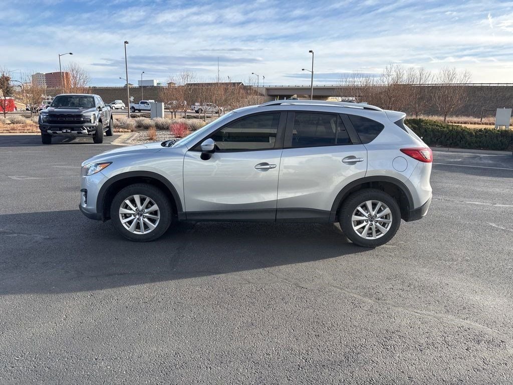 Used 2016 Mazda CX-5 Touring with VIN JM3KE4CY0G0863112 for sale in Loveland, CO