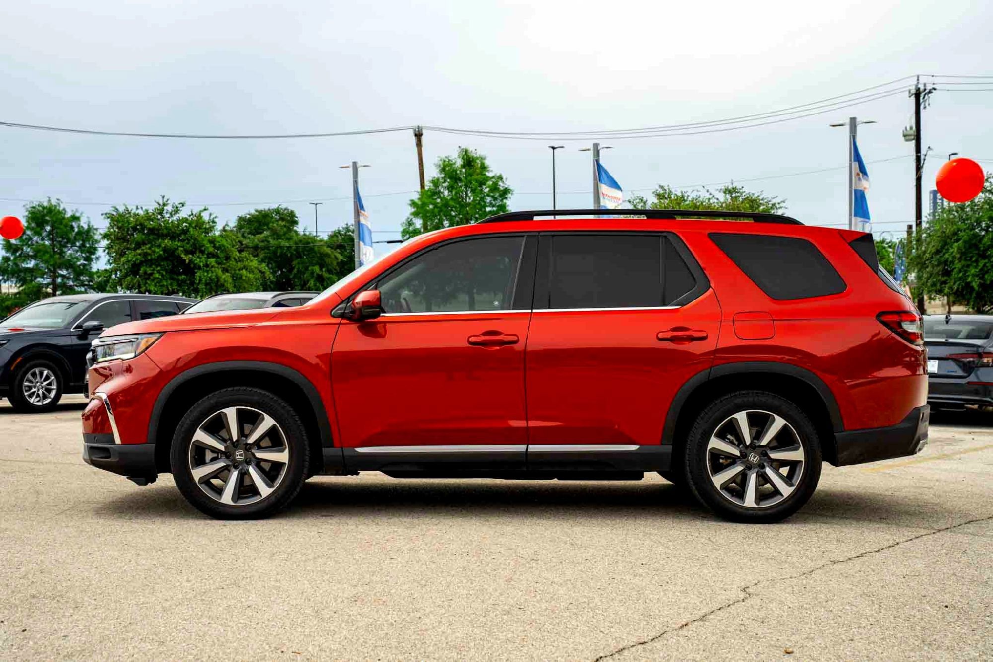 Used 2024 Radiant Red Metallic II Honda Touring image 7