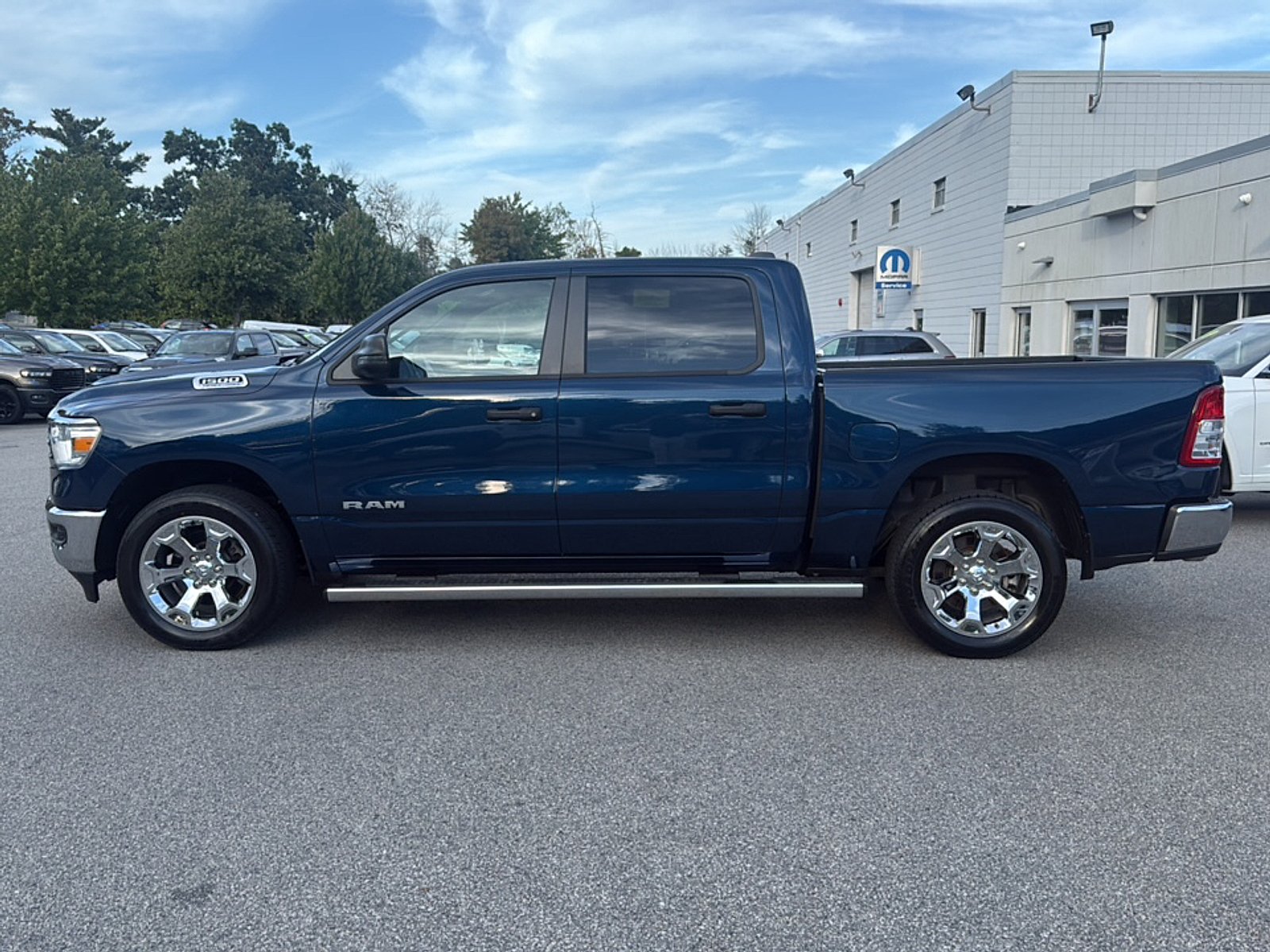 Used 2023 Patriot Blue Pearlcoat Ram Big Horn Crew Cab 4x4 5